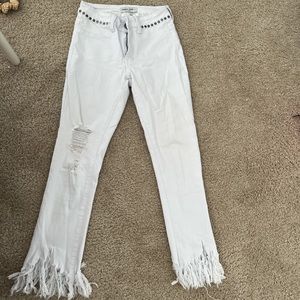 white low rise distressed studded fringe skinny jeans